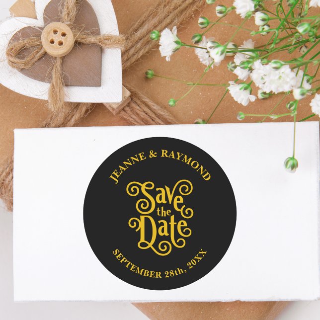 Calligraphy Black Gold Wedding Save the Date Classic Round Sticker (Black and gold calligraphy sticker adds timeless charm to wedding save the date mailings.)