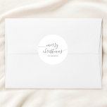 Calligraphy Minimalist Merry Christmas White Classic Round Sticker<br><div class="desc">Introducing our Personalised Round Sticker, where festive elegance meets a personal touch. Emblazoned with the heartfelt phrase "Merry Christmas" in a contemporary modern script, this sticker instantly imbues any surface with the joy of the season. But what truly sets it apart is the space beneath the festive greeting, reserved for...</div>