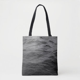 Calm body of water tote bag