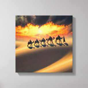 Camel train crossing the desert canvas print