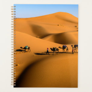 camels on desert under blue sky planner