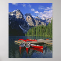 Canada, Alberta, Moraine Lake. Red canoes await
