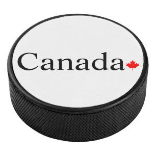 Canada typography with red maple leaf hockey puck