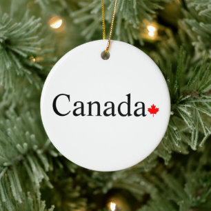 Canada typography with red maple leaf white ceramic tree decoration