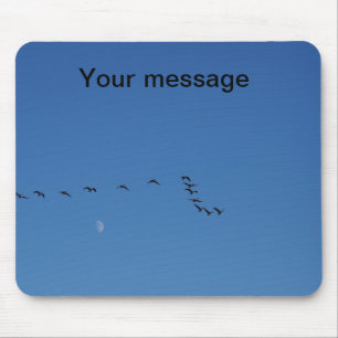 Canadian geese in flight mouse pad