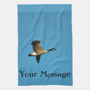 Canadian goose in flight  tea towel