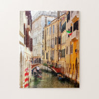 Canal between Venice Houses with gondolas, Italy