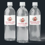 Candle Centerpiece with Poinsettia Flower Water Bottle Label<br><div class="desc">Water bottle labels with a pretty bouquet made with watercolors. Red candles with gold accents and a smaller white candle too. Surrounded by a pine bouquet with a poinsettia flower.</div>