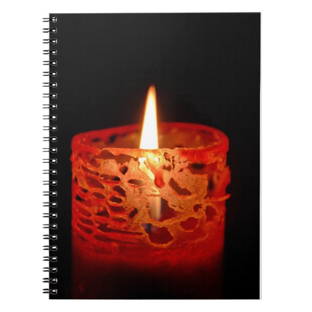 Candle on a black background notebook (Front)