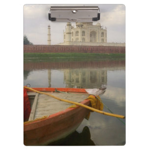 Canoe in water with Taj Mahal, Agra, India Clipboard