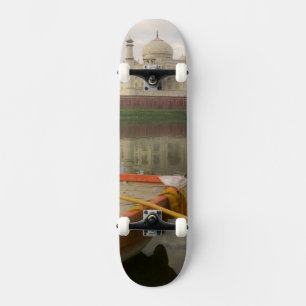 Canoe in water with Taj Mahal, Agra, India Skateboard