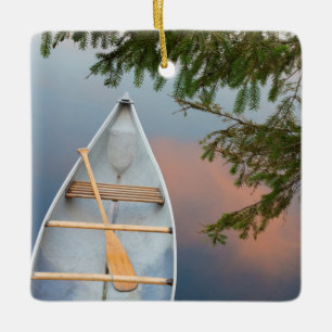 Canoe on lake at sunset, Canada Ceramic Tree Decoration