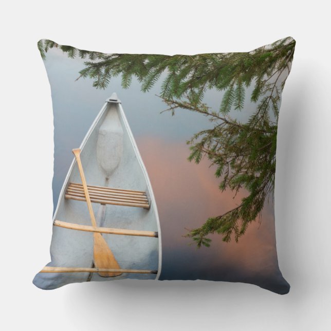 Canoe on lake at sunset, Canada Cushion (Front)