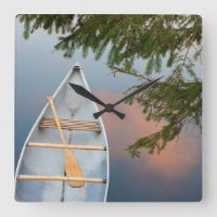 Canoe on lake at sunset, Canada