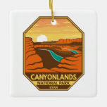 Canyonlands National Park Sunset Retro Emblem Ceramic Ornament<br><div class="desc">Canyonlands vector artwork design. The park is known for its dramatic desert landscape carved by the Colorado River. Island in the Sky is a huge,  flat-topped mesa with panoramic overlooks.</div>
