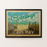 Cape May Beach Vintage Travel Jigsaw Puzzle<br><div class="desc">This Greetings From Cape May vintage postcard design features a sandy beach with a beautiful turquoise ocean water and above the sea,  a blue sky with billowy white clouds. In vintage travels style.</div>