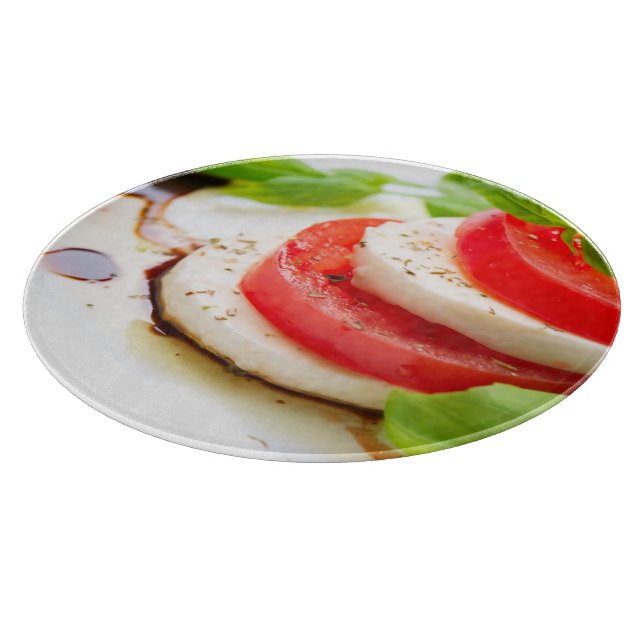 Caprese Salad. Tomato and Mozzarella slices Cutting Board (Corner)