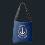Captain Your Boat Name Anchor Gold Laurel Navy Crossbody Bag<br><div class="desc">A stylish cross-body tote bag with Captain or other title, your personalised name, boat name or other desired text. Features a custom designed nautical boat anchor with gold style laurel leaves and star on navy blue. Easily customise the base colour to match your current decor or theme. Reusable and great...</div>