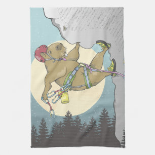 Capybara rock climbing tea towel