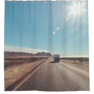 Car on black asphalt road shower curtain