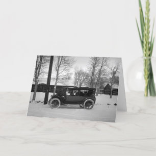 Car with Christmas tree tied on the hood Holiday Card