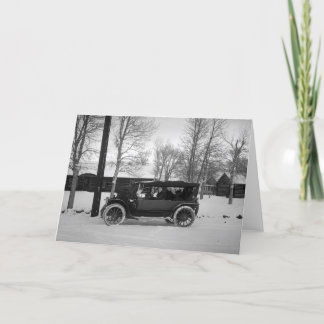 Car with Christmas tree tied on the hood Holiday Card