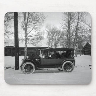 Car with Christmas tree tied on the hood Mouse Pad