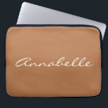 Caramel Brown Script Name Minimalist Personalised Laptop Sleeve<br><div class="desc">This laptop sleeve features a warm caramel brown background with a name in flowing cream script right across the front — simple, personal, and really easy to spot in a bag. It's a great gift for a college student, a new grad, or really anyone who wants their laptop to feel...</div>