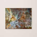 Carina Nebula Hubble Space Jigsaw Puzzle<br><div class="desc">This is a NASA space photograph from the Hubble Telescope. It is a composite image of the nebula NGC 3372, also known as the Carina nebula. In this pretty image it has a cloudy appearance, with red and blue areas. Red corresponds to areas of sulphur emission, green to hydrogen, and...</div>