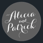 Carolyna Wedding Classic Round Sticker<br><div class="desc">Elegant wedding design featuring the bride and groom's names in a large whimsical hand lettered style script. The colours and fonts in the design are all fully customisable. For matching items such as rsvp cards, stickers, insert cards and more, click the link below to view the entire Carolyna Wedding collection....</div>