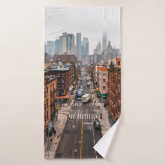 CARS ON ROAD BETWEEN HIGH RISE BUILDINGS DURING DA BATH TOWEL