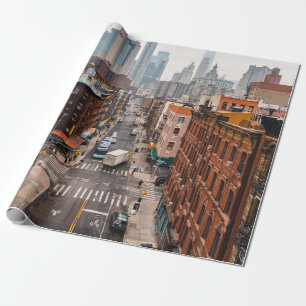 CARS ON ROAD BETWEEN HIGH RISE BUILDINGS DURING DA WRAPPING PAPER