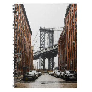 CARS PARKED NEAR BROWN BUILDING NOTEBOOK