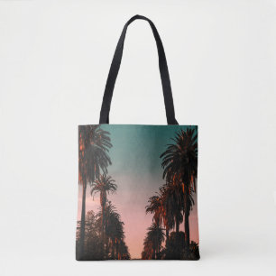 Cars parked on grey concrete near trees tote bag
