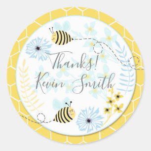 Cartoon bumblebees on a background of blue, yellow classic round sticker