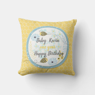Cartoon bumblebees on a background of blue, yellow cushion