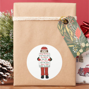 Cartoon Child holding Christmas Greetings Sign Classic Round Sticker