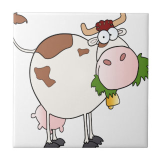 Cartoon cow eating grass tile
