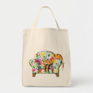 Cartoon Kitty asleep on a floral chair Tote Bag