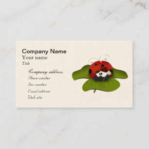 Cartoon ladybug on a green leaf business card