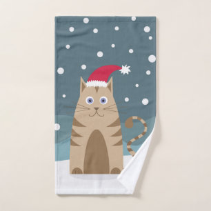 Cartoon xmas cat wearing santa hat in snow hand towel