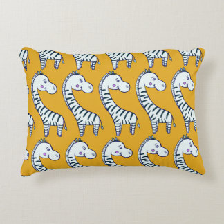 Cartoon zebras: yellow background pattern. decorative cushion