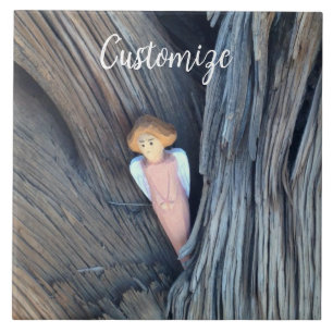 Carved angel in tree Thunder Cove Tile