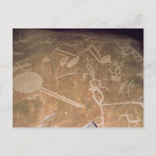 Carved petroglyph depicting figures postcard
