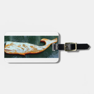carved whale tag