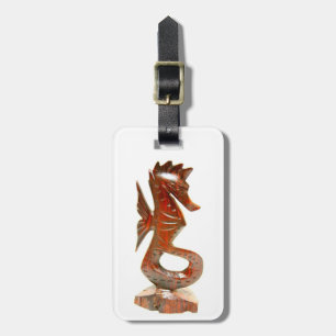 carved wood seahorse tag