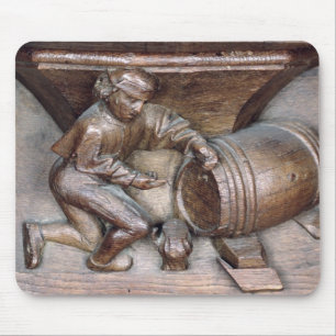 Carving depicting a man putting a tap on barrel mouse pad