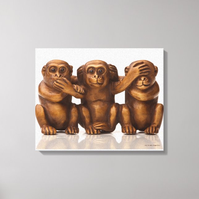 Carving of three wooden monkeys canvas print (Front)