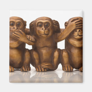 Carving of three wooden monkeys magnet