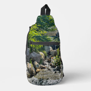 Cascading forest waterfall   forest greenery   sling bag